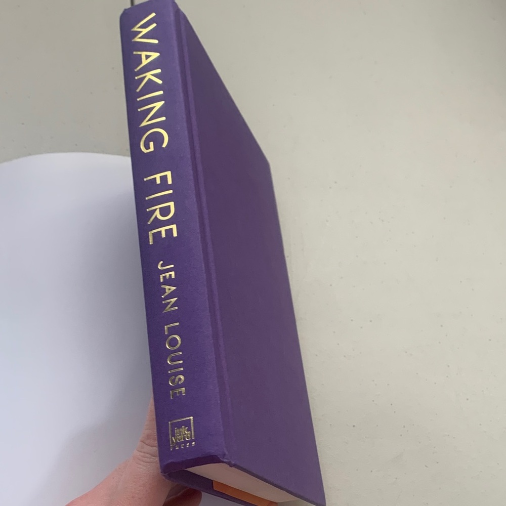 Waking Fire Written by Jean Louise Hardcover Book - Picture 5 of 6